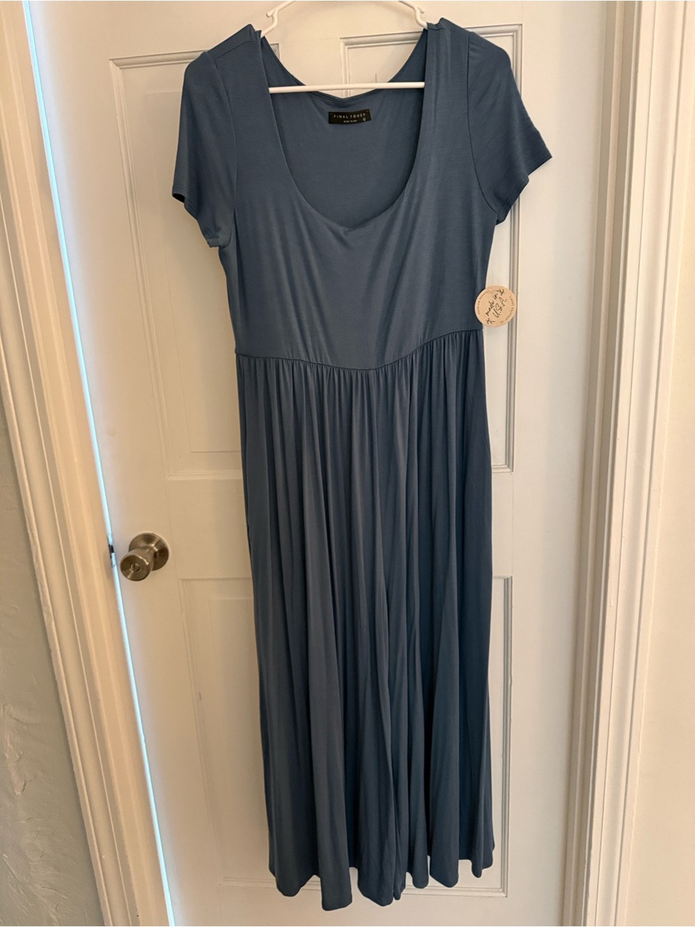 Final Touch cropped wide leg jumpsuit with cap sleeve.
